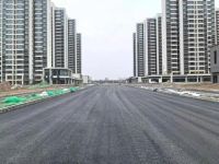 泾河新城崇文塔北路北段项目可实施段沥青铺设顺利完工